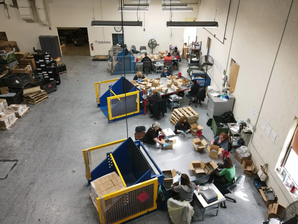 Sort-Tek team hand-sorting fasteners