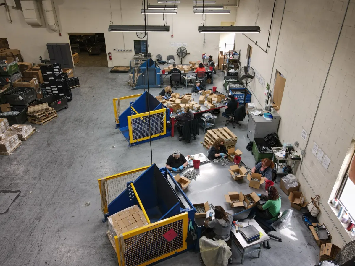 Sort-Tek team inspecting and packaging fasteners